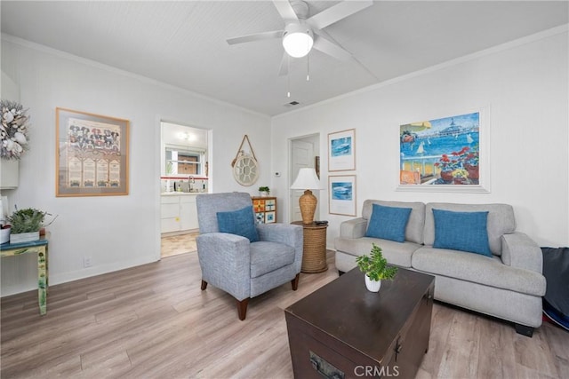302 Sapphire Ave, Newport Beach, CA 92662 - living room with ornamental molding, ceiling fan, and light wood finished floors