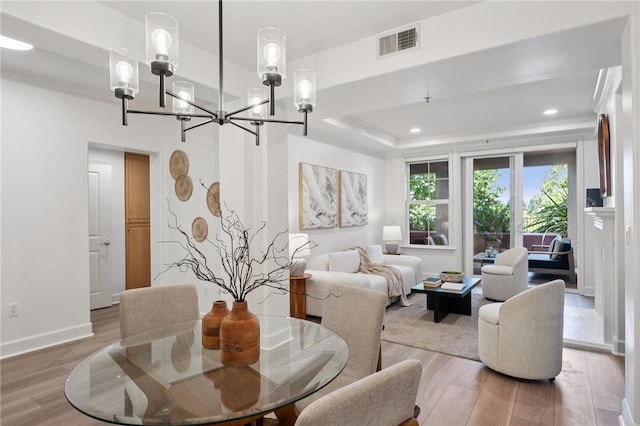 1800 Alma Ave Unit 106, Walnut Creek, CA 94596 - dining area with a chandelier, wood finished floors, recessed lighting, and a raised ceiling