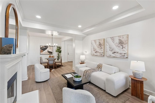 1800 Alma Ave Unit 106, Walnut Creek, CA 94596 - living area featuring a tray ceiling, light wood-style floors, a chandelier, recessed lighting, and ornamental molding
