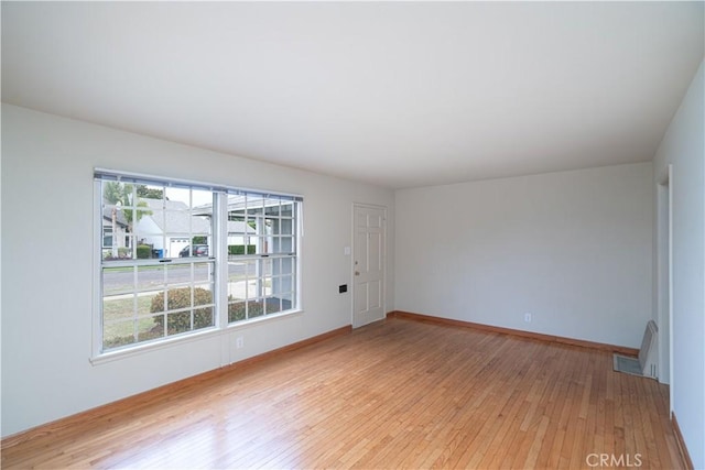 2124 Rutgers Ave, Long Beach, CA 90815 - spare room featuring light wood-style floors and baseboards