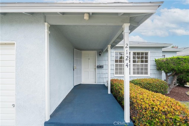 2124 Rutgers Ave, Long Beach, CA 90815 - view of exterior entry with stucco siding
