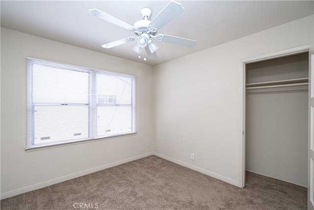 2124 Rutgers Ave, Long Beach, CA 90815 - unfurnished bedroom with carpet flooring, a closet, and a ceiling fan
