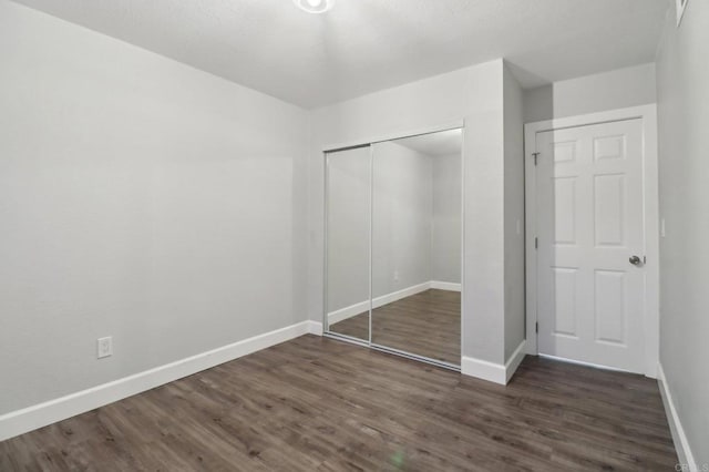 1204 E El Norte Pkwy, Escondido, CA 92027 - unfurnished bedroom featuring a closet and wood finished floors