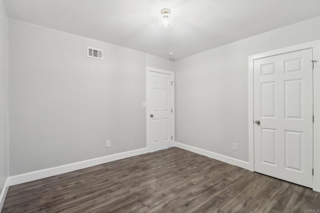 1204 E El Norte Pkwy, Escondido, CA 92027 - spare room with dark wood-style flooring and baseboards