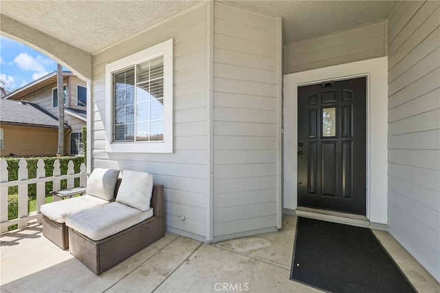251 E Center St, Covina, CA 91723 - doorway to property featuring covered porch