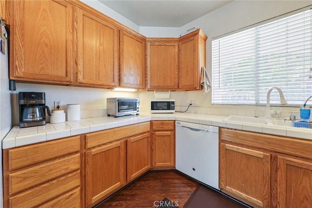 251 E Center St, Covina, CA 91723 - kitchen featuring white appliances, dark wood-type flooring, light countertops, and brown cabinets