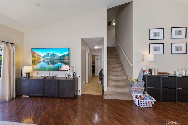 251 E Center St, Covina, CA 91723 - staircase featuring wood finished floors and vaulted ceiling
