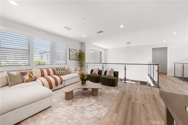 61 Dorado, Irvine, CA 92618 - living room with light wood-style flooring and recessed lighting