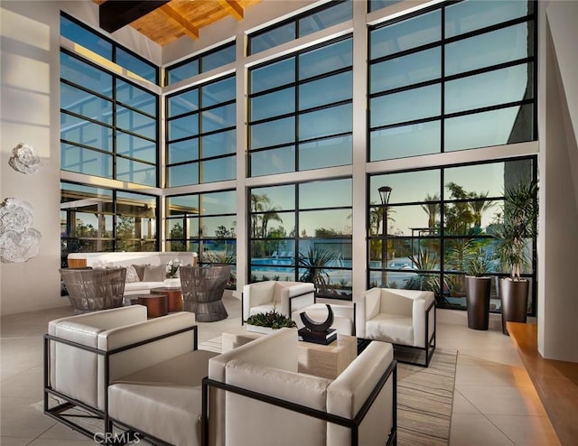 61 Dorado, Irvine, CA 92618 - community lobby with a towering ceiling, expansive windows, and a wood ceiling with exposed beams