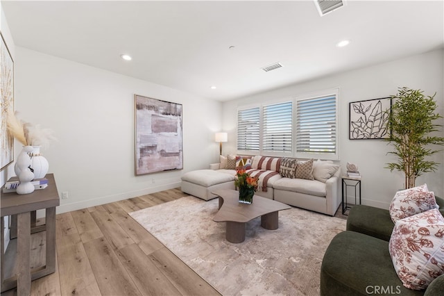 61 Dorado, Irvine, CA 92618 - living room featuring light wood finished floors and recessed lighting