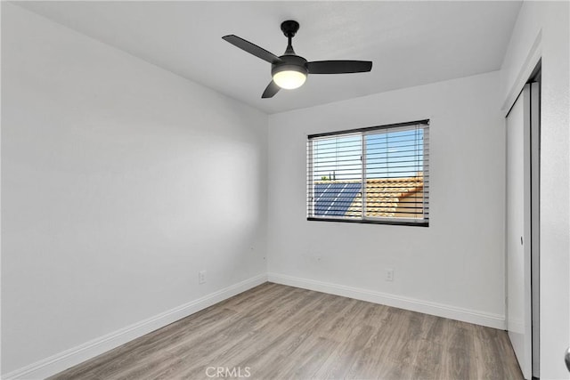 12725 Sundown Rd, Victorville, CA 92392 - unfurnished bedroom featuring light wood finished floors, a closet, and a ceiling fan
