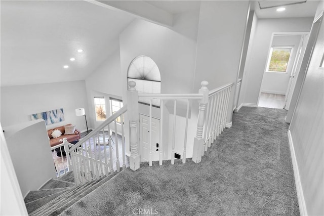 12725 Sundown Rd, Victorville, CA 92392 - hall featuring carpet floors, an upstairs landing, vaulted ceiling, and recessed lighting