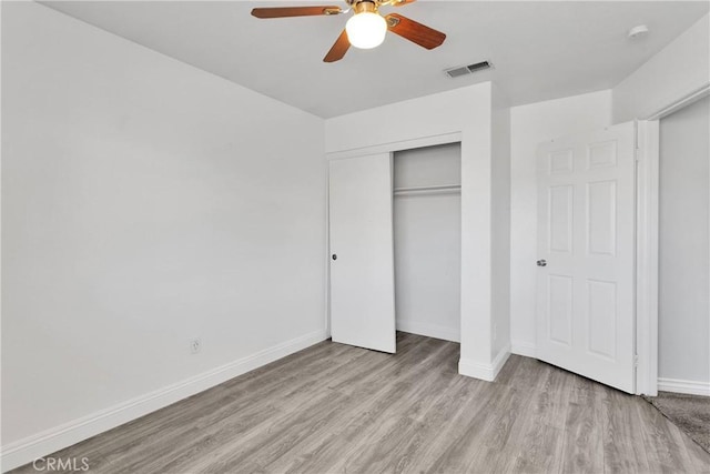 12725 Sundown Rd, Victorville, CA 92392 - unfurnished bedroom featuring light wood-style floors, a closet, and ceiling fan