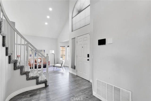 12725 Sundown Rd, Victorville, CA 92392 - entrance foyer with stairs, high vaulted ceiling, wood finished floors, and recessed lighting