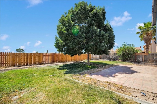 12725 Sundown Rd, Victorville, CA 92392 - fenced backyard featuring a patio area