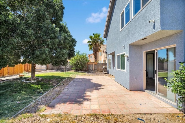 12725 Sundown Rd, Victorville, CA 92392 - fenced backyard with a patio area