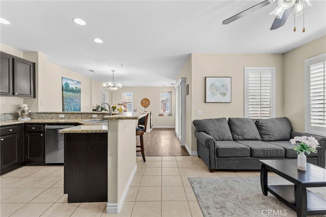 39903 Millbrook Way Unit 7C, Murrieta, CA 92563 - kitchen featuring dishwasher, a kitchen bar, light tile patterned floors, ceiling fan, and recessed lighting