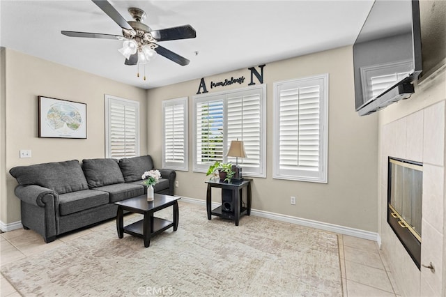 39903 Millbrook Way Unit 7C, Murrieta, CA 92563 - tiled living room featuring a ceiling fan and baseboards