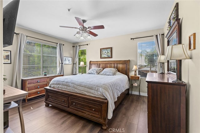39903 Millbrook Way Unit 7C, Murrieta, CA 92563 - bedroom featuring dark wood finished floors and a ceiling fan