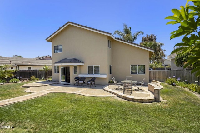 2085 Koala Pl, Oxnard, CA 93036 - back of house with stucco siding, a fenced backyard, and a patio