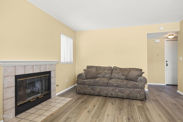 2085 Koala Pl, Oxnard, CA 93036 - living room with wood finished floors and a tile fireplace