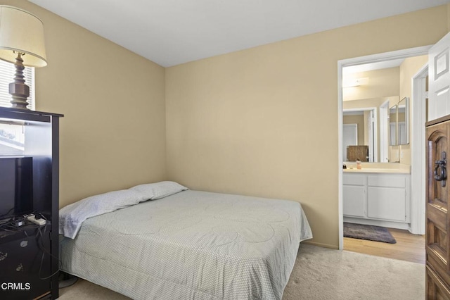 2085 Koala Pl, Oxnard, CA 93036 - bedroom featuring light colored carpet and connected bathroom