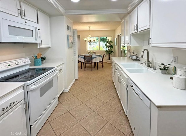 3525 Bahia Blanca W Unit B, Laguna Woods, CA 92637 - kitchen featuring white appliances, a chandelier, ornamental molding, light countertops, and white cabinetry