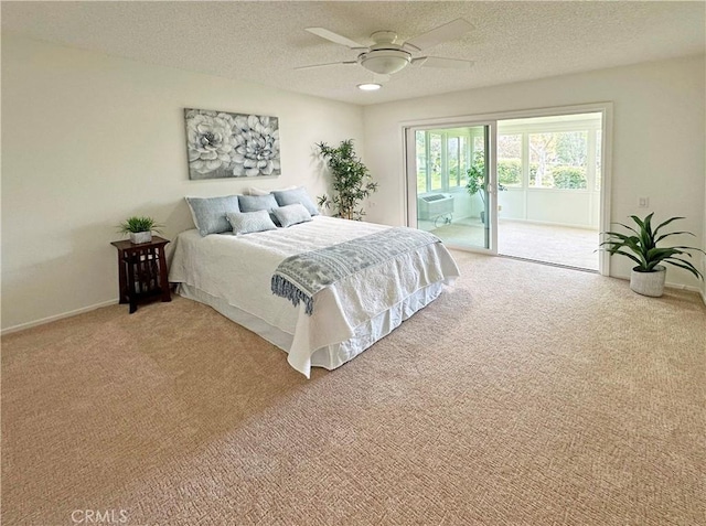 3525 Bahia Blanca W Unit B, Laguna Woods, CA 92637 - bedroom with access to outside, light colored carpet, a textured ceiling, and ceiling fan