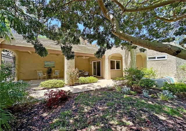 3525 Bahia Blanca W Unit B, Laguna Woods, CA 92637 - rear view of property featuring a patio and stucco siding