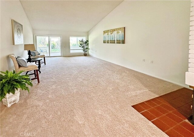 3525 Bahia Blanca W Unit B, Laguna Woods, CA 92637 - living area with carpet floors and high vaulted ceiling