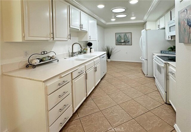 3525 Bahia Blanca W Unit B, Laguna Woods, CA 92637 - kitchen featuring white appliances, ornamental molding, light countertops, a raised ceiling, and light tile patterned floors
