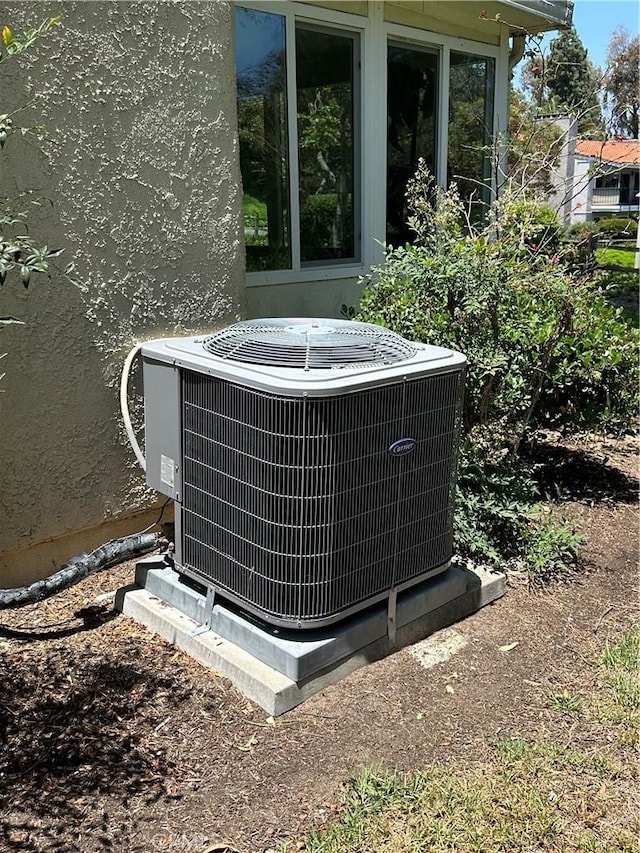 3525 Bahia Blanca W Unit B, Laguna Woods, CA 92637 - exterior view of a cooling unit and stucco siding