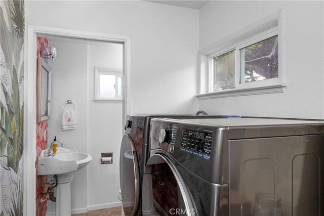 329 Travis Dr, Los Osos, CA 93402 - washroom featuring washing machine and clothes dryer and carpet flooring