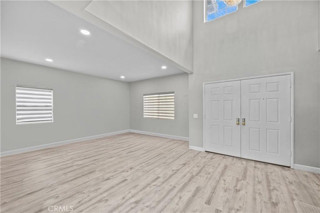 2504 Martingail Dr, Covina, CA 91724 - foyer entrance featuring wood finished floors, healthy amount of natural light, a high ceiling, and recessed lighting