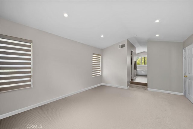 2504 Martingail Dr, Covina, CA 91724 - carpeted spare room featuring vaulted ceiling and recessed lighting