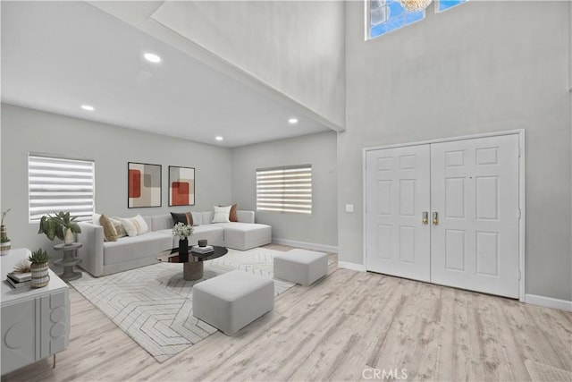 2504 Martingail Dr, Covina, CA 91724 - living area with wood finished floors, a high ceiling, and recessed lighting