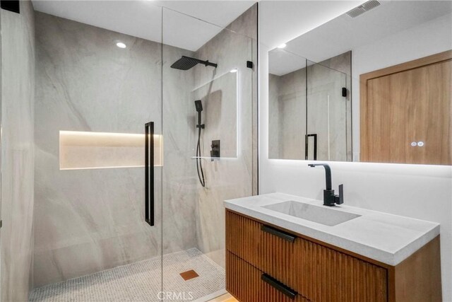 32075 Canterhill Pl, Westlake Village, CA 91361 - full bathroom featuring a marble finish shower and vanity