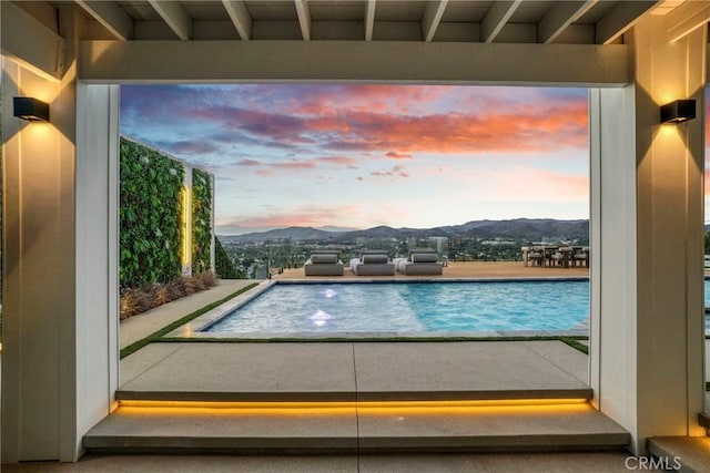32075 Canterhill Pl, Westlake Village, CA 91361 - pool at dusk featuring a mountain view and an outdoor pool