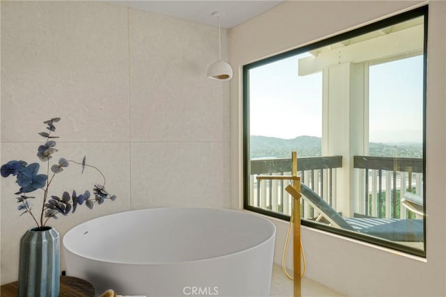 32075 Canterhill Pl, Westlake Village, CA 91361 - full bathroom featuring a soaking tub, plenty of natural light, and a mountain view
