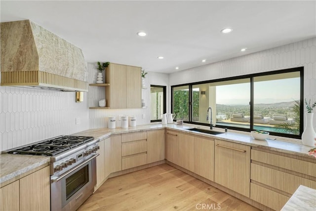32075 Canterhill Pl, Westlake Village, CA 91361 - kitchen with light brown cabinets, high end stainless steel range, premium range hood, open shelves, and light wood finished floors