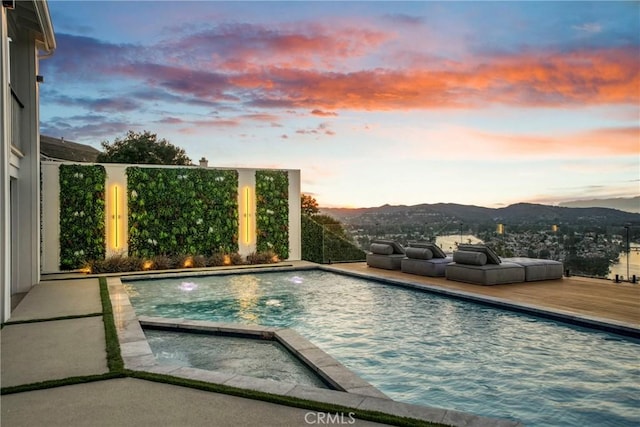 32075 Canterhill Pl, Westlake Village, CA 91361 - pool at dusk featuring a mountain view and an outdoor pool