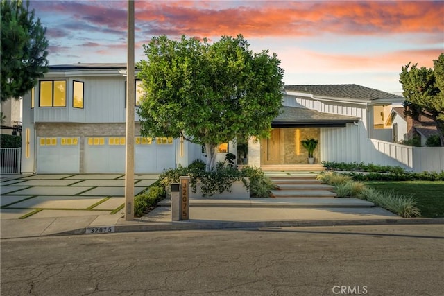 32075 Canterhill Pl, Westlake Village, CA 91361 - view of front of house with concrete driveway and a garage