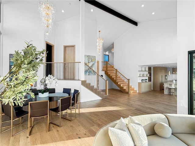 32075 Canterhill Pl, Westlake Village, CA 91361 - living room featuring high vaulted ceiling, a chandelier, stairway, beam ceiling, and wood finished floors