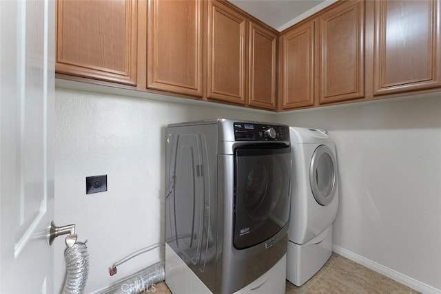 29184 Stone Ridge St, Menifee, CA 92584 - laundry area with cabinet space, hookup for an electric dryer, and light tile patterned floors