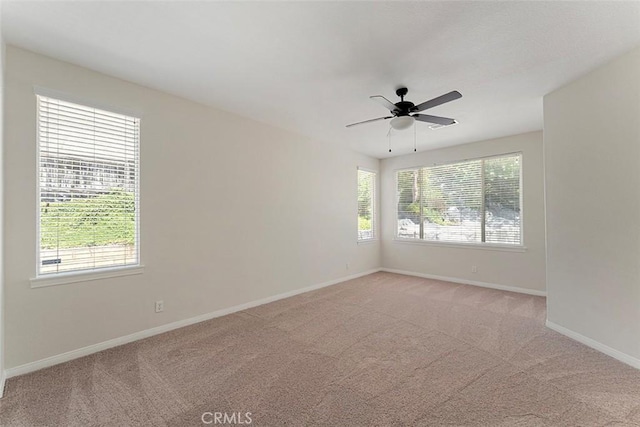 29184 Stone Ridge St, Menifee, CA 92584 - spare room featuring light colored carpet and a ceiling fan