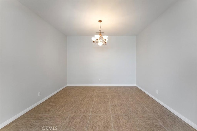 29184 Stone Ridge St, Menifee, CA 92584 - spare room with a chandelier and baseboards