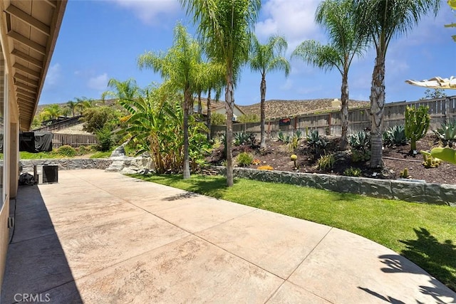 29184 Stone Ridge St, Menifee, CA 92584 - fenced backyard featuring a patio