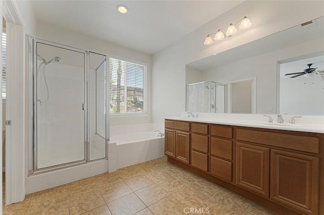 29184 Stone Ridge St, Menifee, CA 92584 - bathroom featuring double vanity, a garden tub, a shower stall, and tile patterned floors