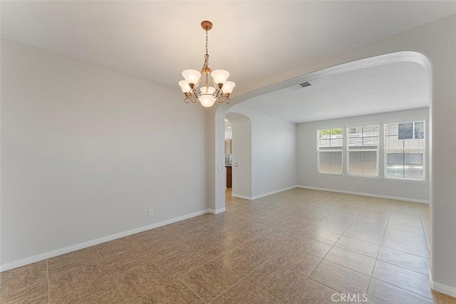 29184 Stone Ridge St, Menifee, CA 92584 - empty room with arched walkways and a chandelier