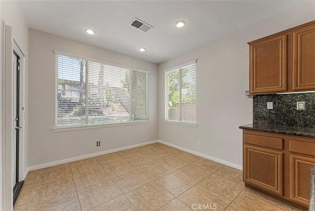 29184 Stone Ridge St, Menifee, CA 92584 - unfurnished dining area featuring recessed lighting and light tile patterned floors